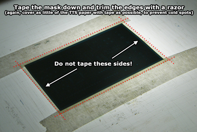 Solder mask taped to PCB, aligned with the artwork