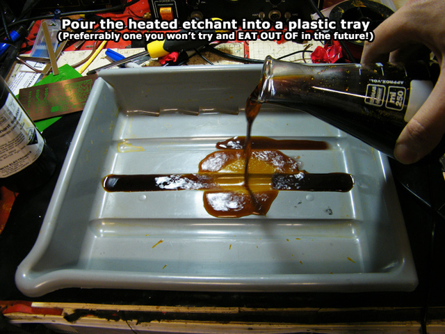 Pouring the etchant into a plastic tray